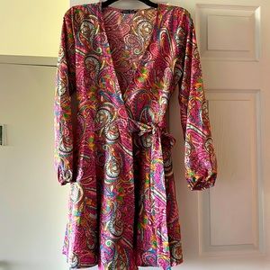 A beautiful non used mini dress by SHEIN.size small